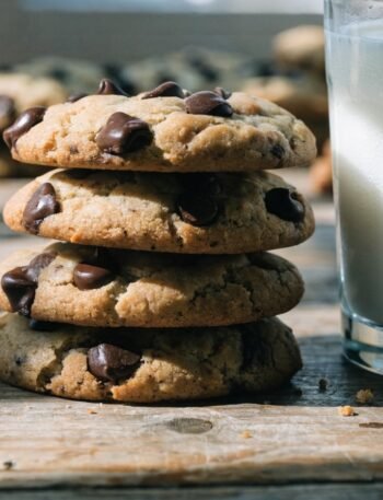 Grandma Ricke's Cookie Recipe recipe hero presentation - Stunning photorealistic hero shot of freshly baked Grandma Ricke's Cookies resting on a rustic woode